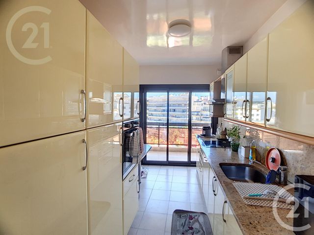 Afficher la photo en grand Appartement F3 à vendre - 3 pièces - 84.25 m2 - JUAN LES PINS - 06 - PROVENCE-ALPES-COTE-D-AZUR - Century 21 Immobilier Service